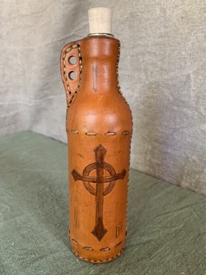 A leather covered bottle