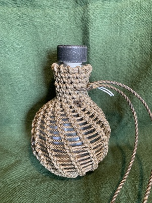 A rope covered bottle